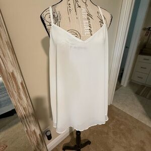 Torrid White Sophie flutter tank! So fun and versatile.